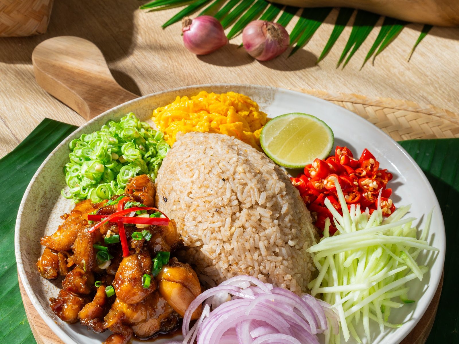 Khao Kluk Kapi: shrimp-paste fried rice with sweet beef, green mango, shallot and omelette