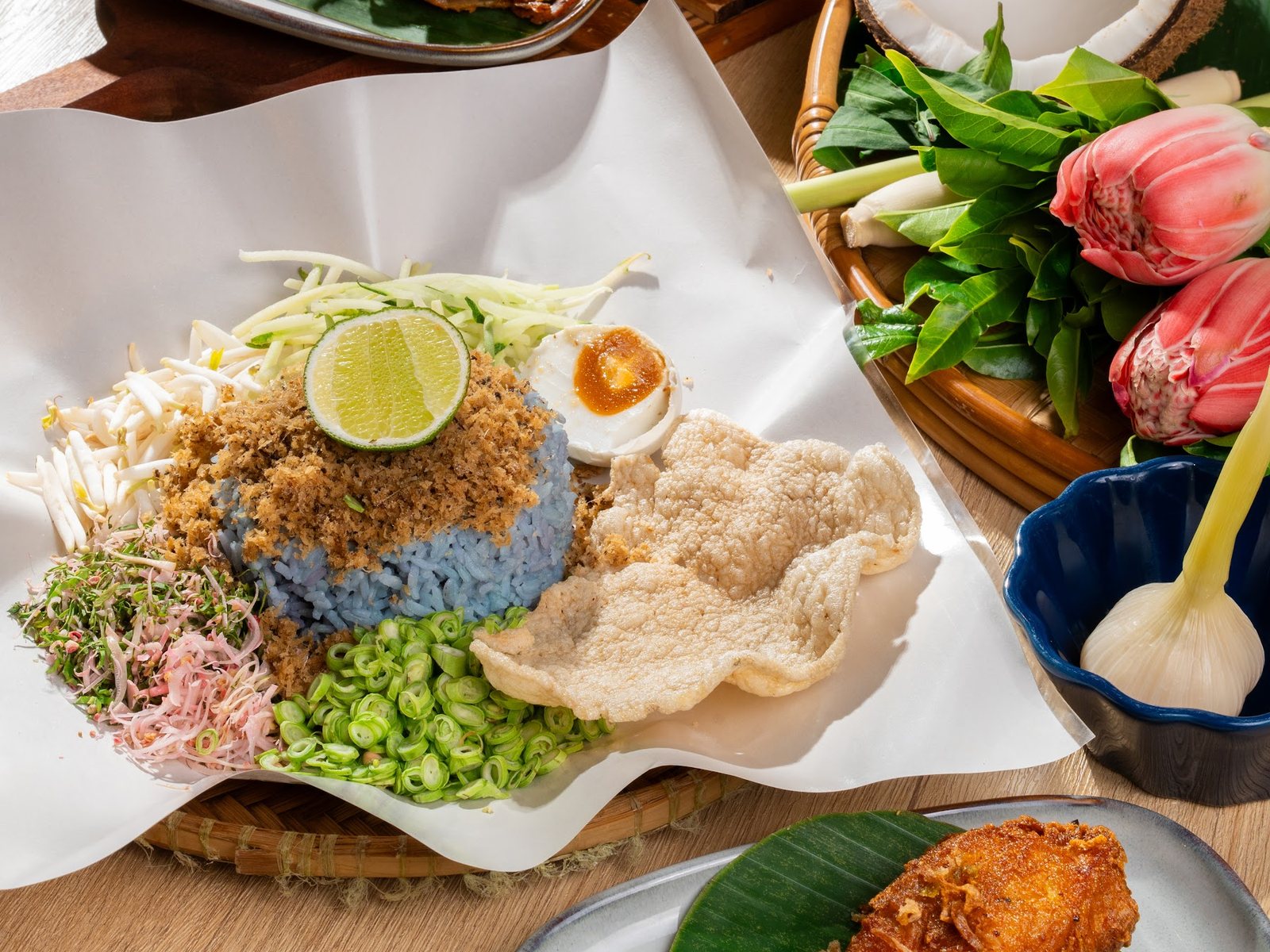 Nasi Kerabu: blue rice, ulam, kerisik, keropok and fried chicken